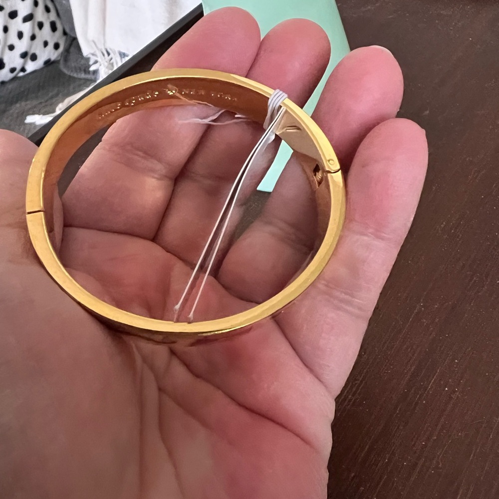 Kate Spade New York gold tone hinged bangle. “Blessing in Disguise” inside. - Picture 6 of 11